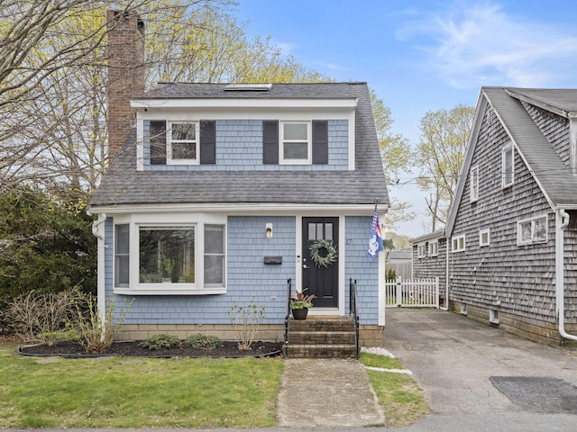 17 Edwards Rd, Hyannis, MA 02601 - view of front of property featuring a chimney and a shingled roof