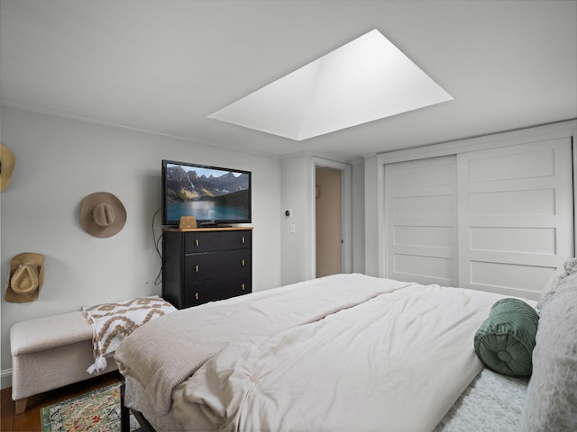 17 Edwards Rd, Hyannis, MA 02601 - bedroom with a skylight, baseboards, and wood finished floors