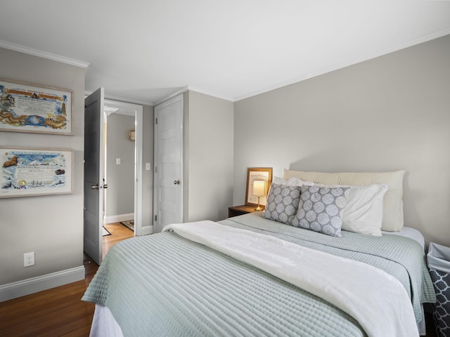 17 Edwards Rd, Hyannis, MA 02601 - bedroom featuring crown molding, baseboards, attic access, and wood finished floors