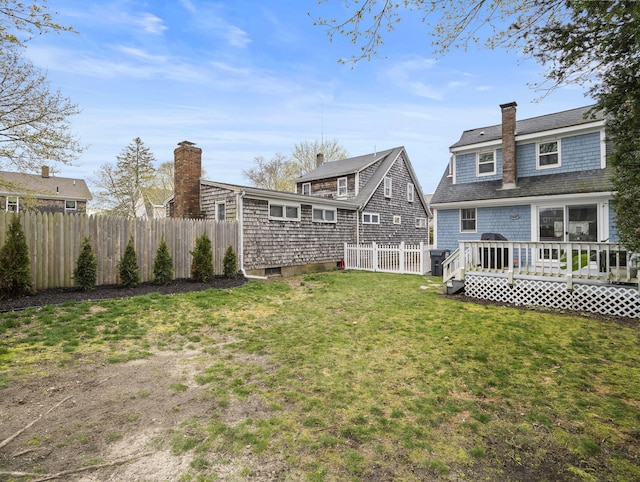 17 Edwards Rd, Hyannis, MA 02601 - view of yard featuring a deck and fence