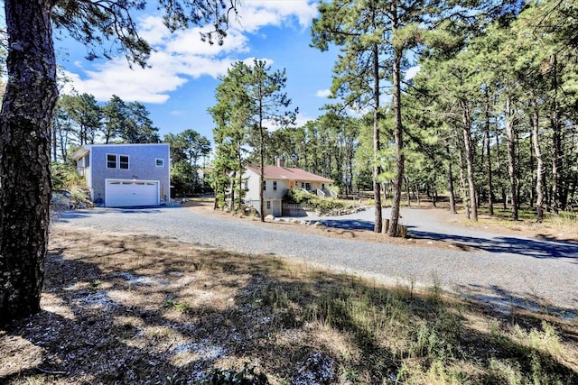 view of yard featuring a garage