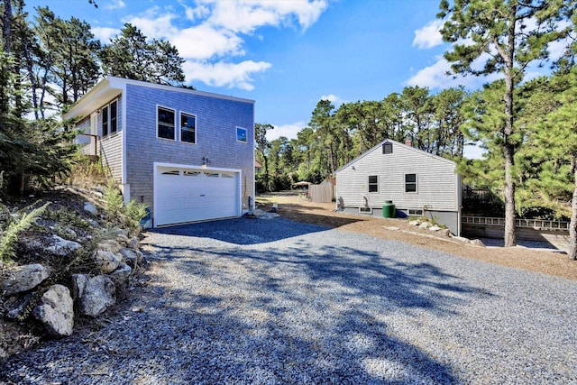 view of home's exterior with a garage