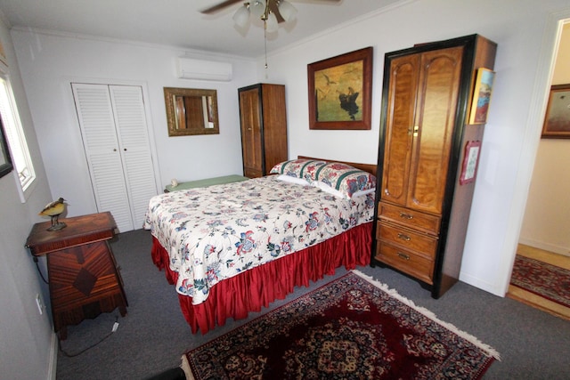 carpeted bedroom with crown molding, a wall mounted air conditioner, a closet, and ceiling fan