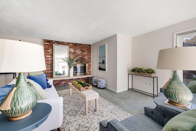 carpeted living room with a brick fireplace