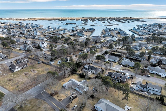 aerial view featuring a water view and a residential view