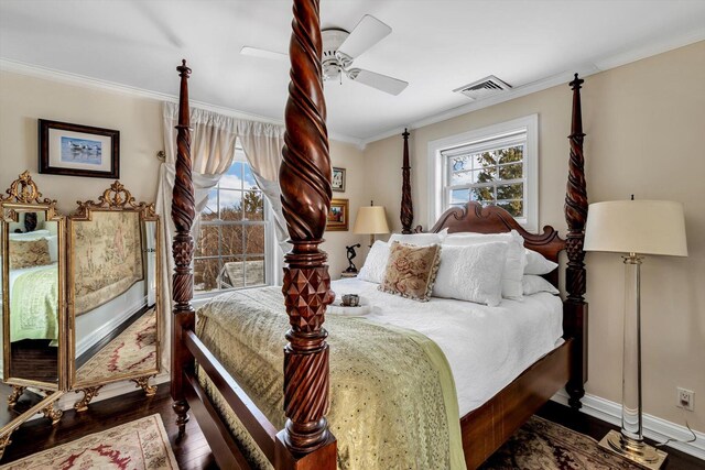 13 Old Colony Way, Provincetown, MA 02657 - bedroom with crown molding, dark wood-type flooring, a ceiling fan, and baseboards