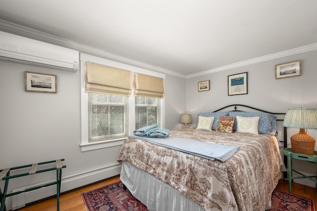bedroom featuring crown molding, an AC wall unit, baseboard heating, and wood finished floors