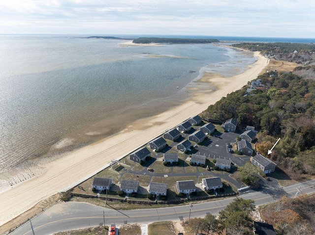 aerial view featuring a water view and a view of the beach