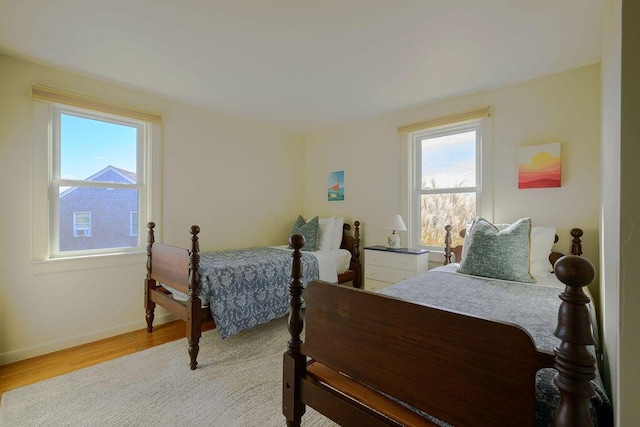 bedroom with light hardwood / wood-style flooring