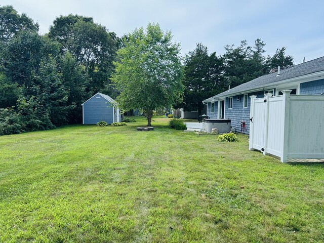 view of yard with a storage shed