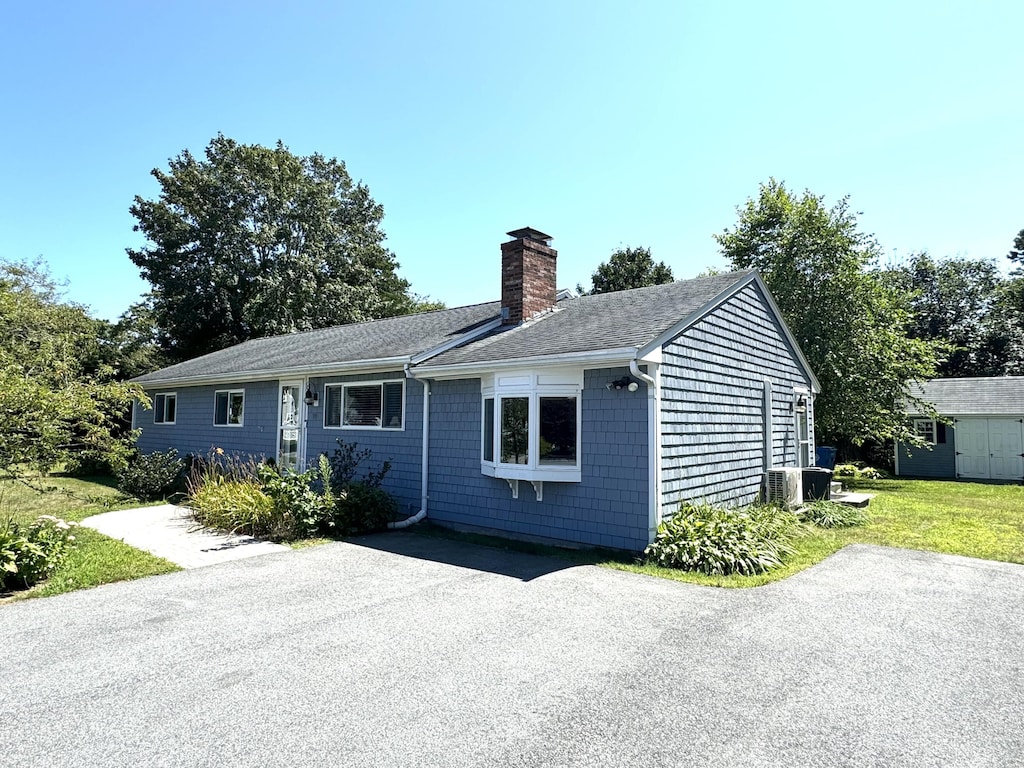 99 Seatucket Rd, East Falmouth, MA 02536 - exterior space with a front lawn