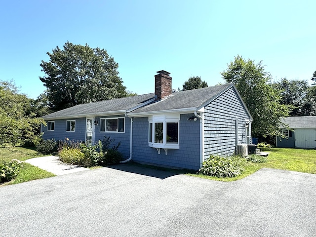 exterior space with a front lawn