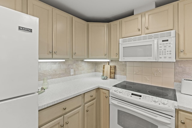 18 W Rd Unit 315, Orleans, MA 02653 - kitchen featuring white appliances, backsplash, light brown cabinetry, and light stone counters