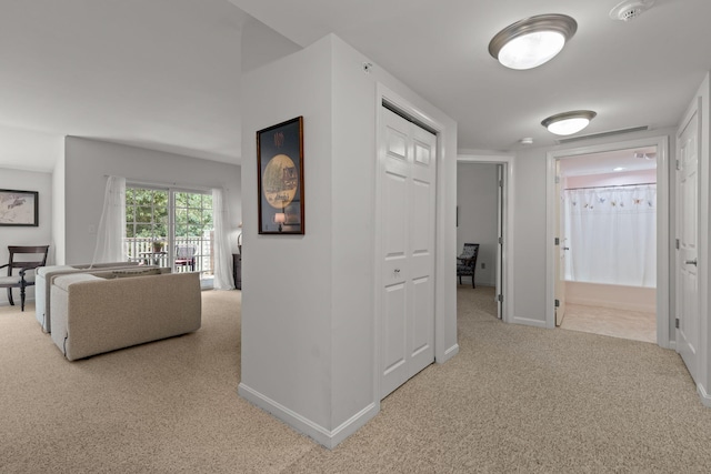 18 W Rd Unit 315, Orleans, MA 02653 - hall with carpet flooring and baseboards