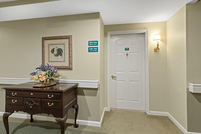 18 W Rd Unit 315, Orleans, MA 02653 - entryway with baseboards and light colored carpet