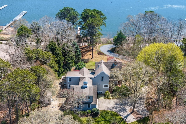 aerial view of property and surrounding area with a large body of water