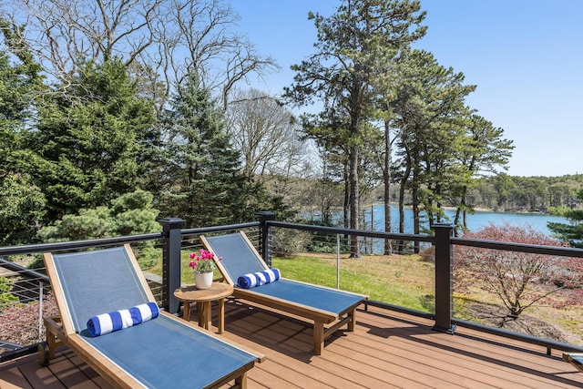 deck featuring a water view