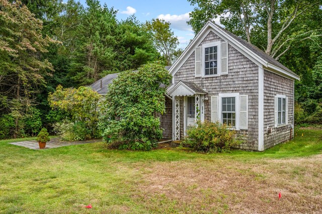 exterior space with a front lawn