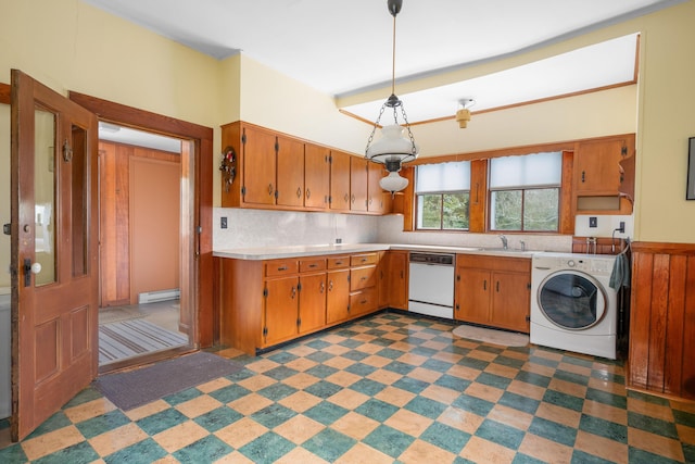 kitchen with white dishwasher, washer / clothes dryer, hanging light fixtures, a baseboard heating unit, and sink