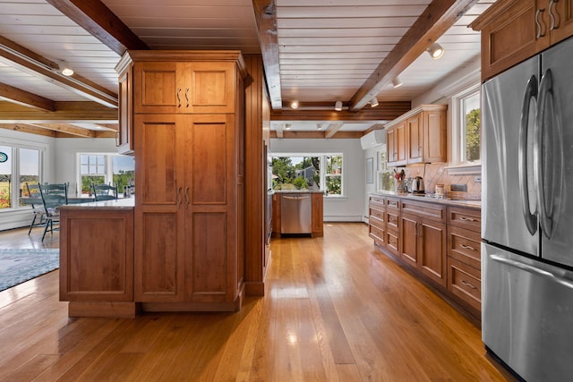 7 Sunrise Ln, Sandwich, MA 02563 - kitchen with appliances with stainless steel finishes, wood ceiling with exposed beams, light wood-type flooring, brown cabinetry, and baseboard heating