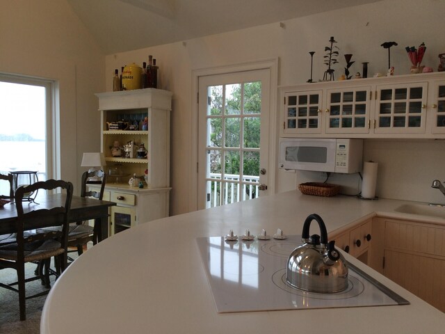 kitchen featuring sink and white appliances