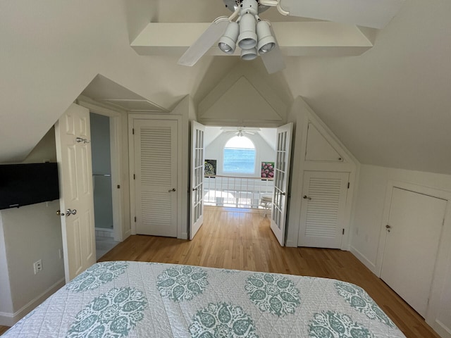 bonus room featuring ceiling fan, light hardwood / wood-style floors, and lofted ceiling