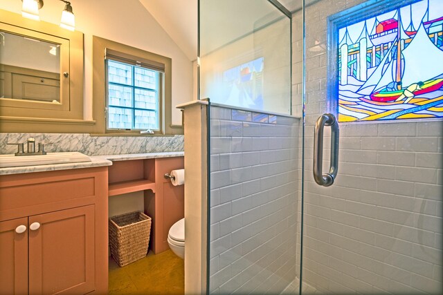351A Commercial St Unit A1, Provincetown, MA 02657 - full bathroom with a stall shower, vanity, and vaulted ceiling