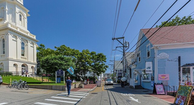 351A Commercial St Unit A1, Provincetown, MA 02657 - view of asphalt street with street lights, sidewalks, and curbs