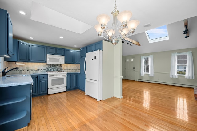 60 Covey Dr, Yarmouth Port, MA 02675 - kitchen featuring blue cabinetry, a sink, light countertops, light wood-style floors, and white appliances