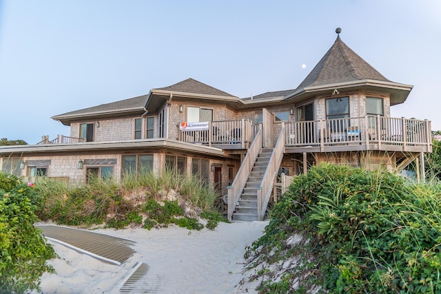 view of front of home featuring a wooden deck