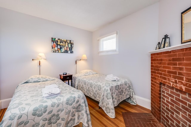 bedroom featuring wood-type flooring