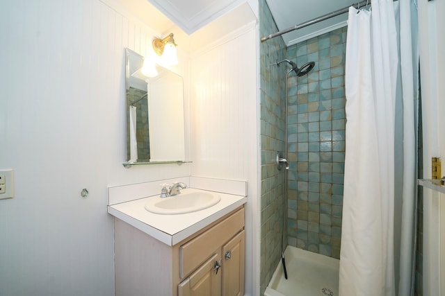 bathroom with a stall shower and vanity