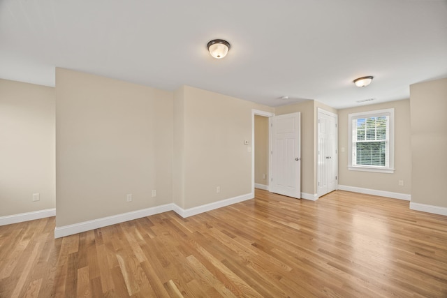 29 Hiawatha Rd, Harwich Port, MA 02646 - empty room featuring baseboards, light wood-style flooring, and visible vents