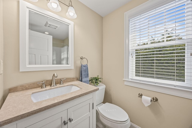 29 Hiawatha Rd, Harwich Port, MA 02646 - bathroom featuring vanity, toilet, and visible vents