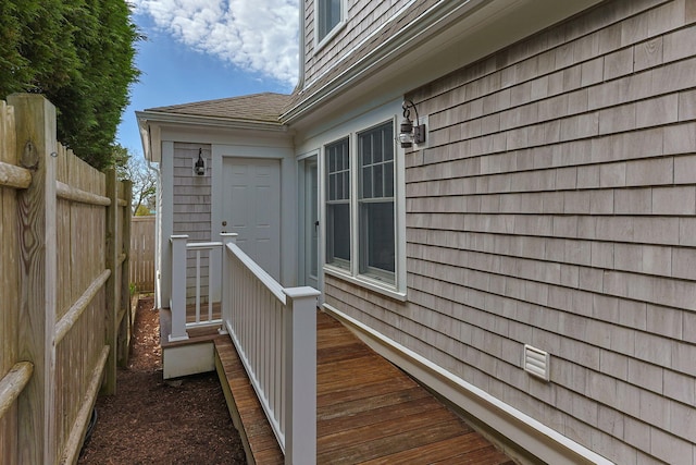 29 Hiawatha Rd, Harwich Port, MA 02646 - view of side of home with fence and roof with shingles