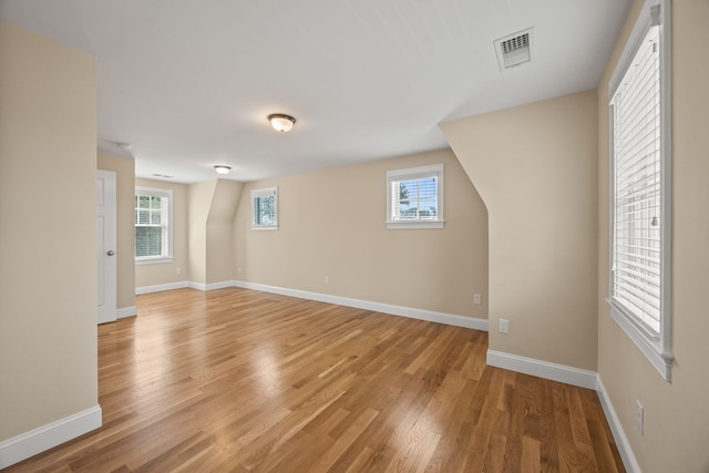 29 Hiawatha Rd, Harwich Port, MA 02646 - additional living space with visible vents, light wood finished floors, and a healthy amount of sunlight