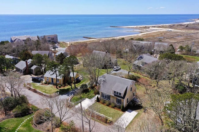 aerial view featuring a view of the beach and a water view