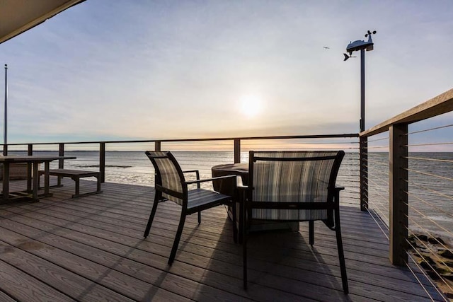 deck at dusk with a water view