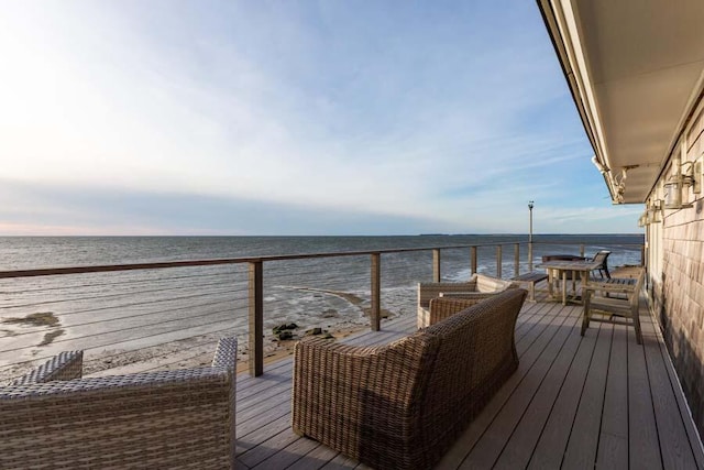 deck featuring a water view