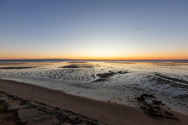 view of water feature with a beach view