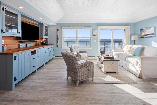 living room featuring a baseboard heating unit, recessed lighting, wood ceiling, and crown molding