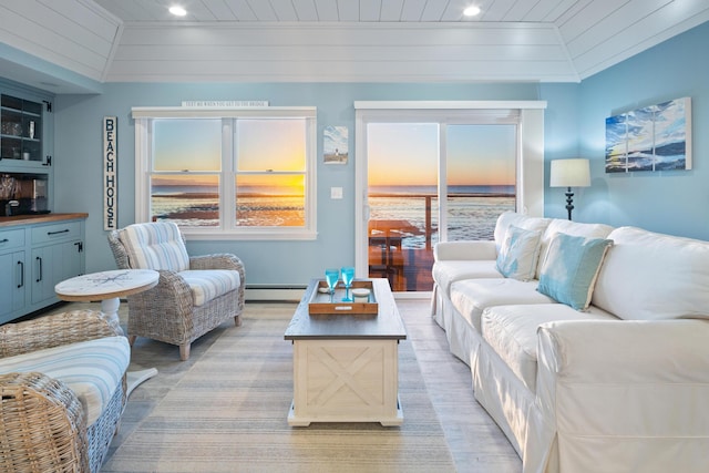 living room with wooden ceiling, a baseboard radiator, and recessed lighting