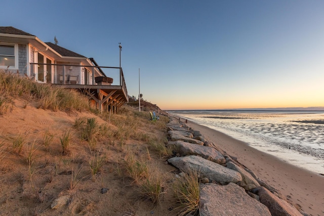 exterior space with a beach view