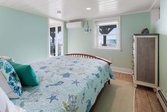 tiled bedroom featuring access to exterior, baseboard heating, a wall unit AC, and baseboards