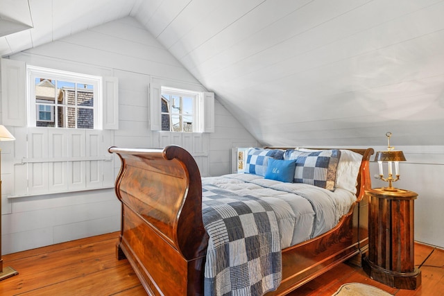 260 Bradford St, Provincetown, MA 02657 - bedroom featuring vaulted ceiling and hardwood / wood-style floors