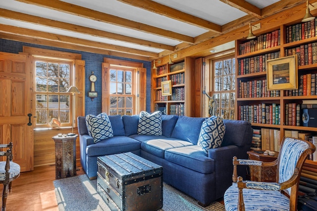 260 Bradford St, Provincetown, MA 02657 - living room featuring healthy amount of natural light, wood finished floors, and beam ceiling
