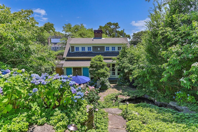 260 Bradford St, Provincetown, MA 02657 - view of front of property with a chimney and a shingled roof