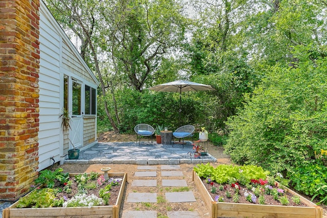 1079 State Hwy Unit 14, Eastham, MA 02642 - view of yard with a garden and a patio area