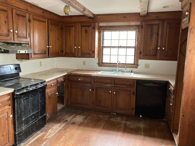 kitchen featuring dark wood-type flooring, beam ceiling, sink, and black appliances