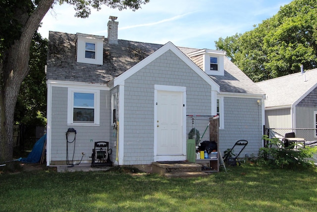 72 Grove St, Hyannis, MA 02601 - back of house with a chimney